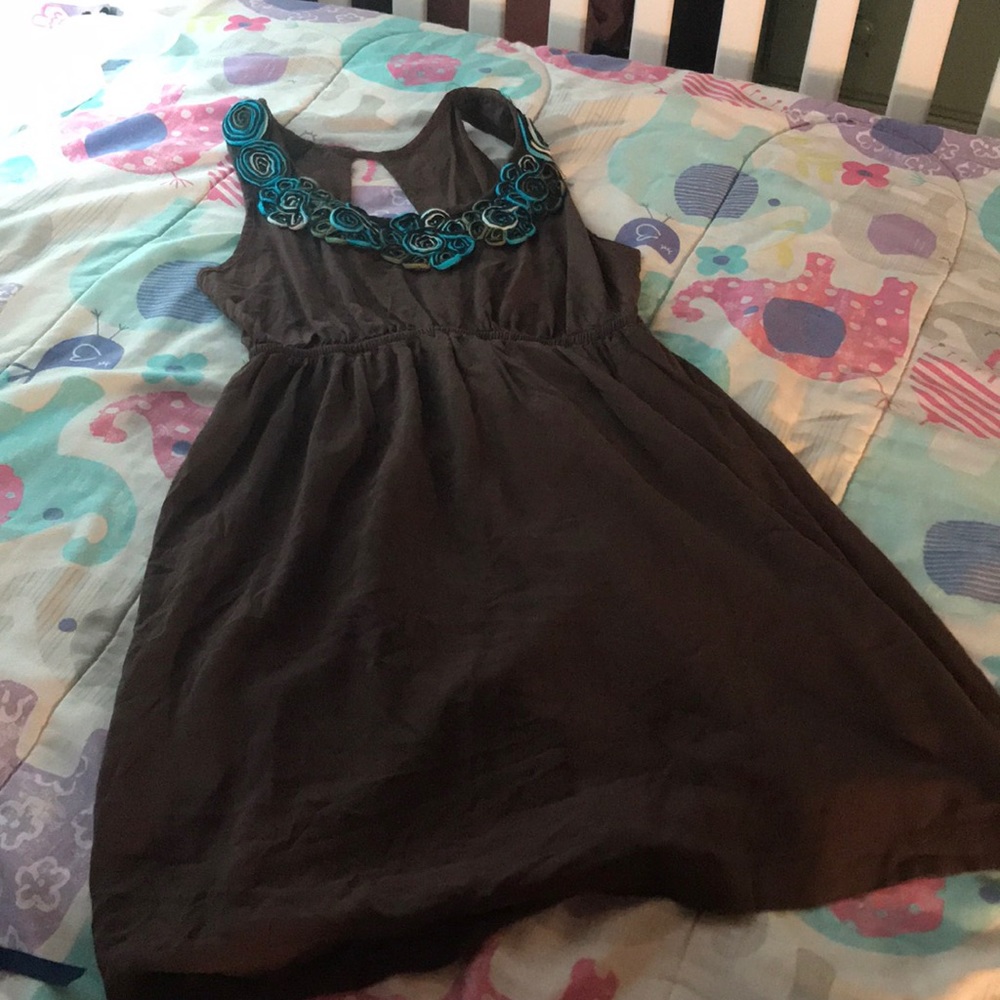 Brown dress with flower patches on top